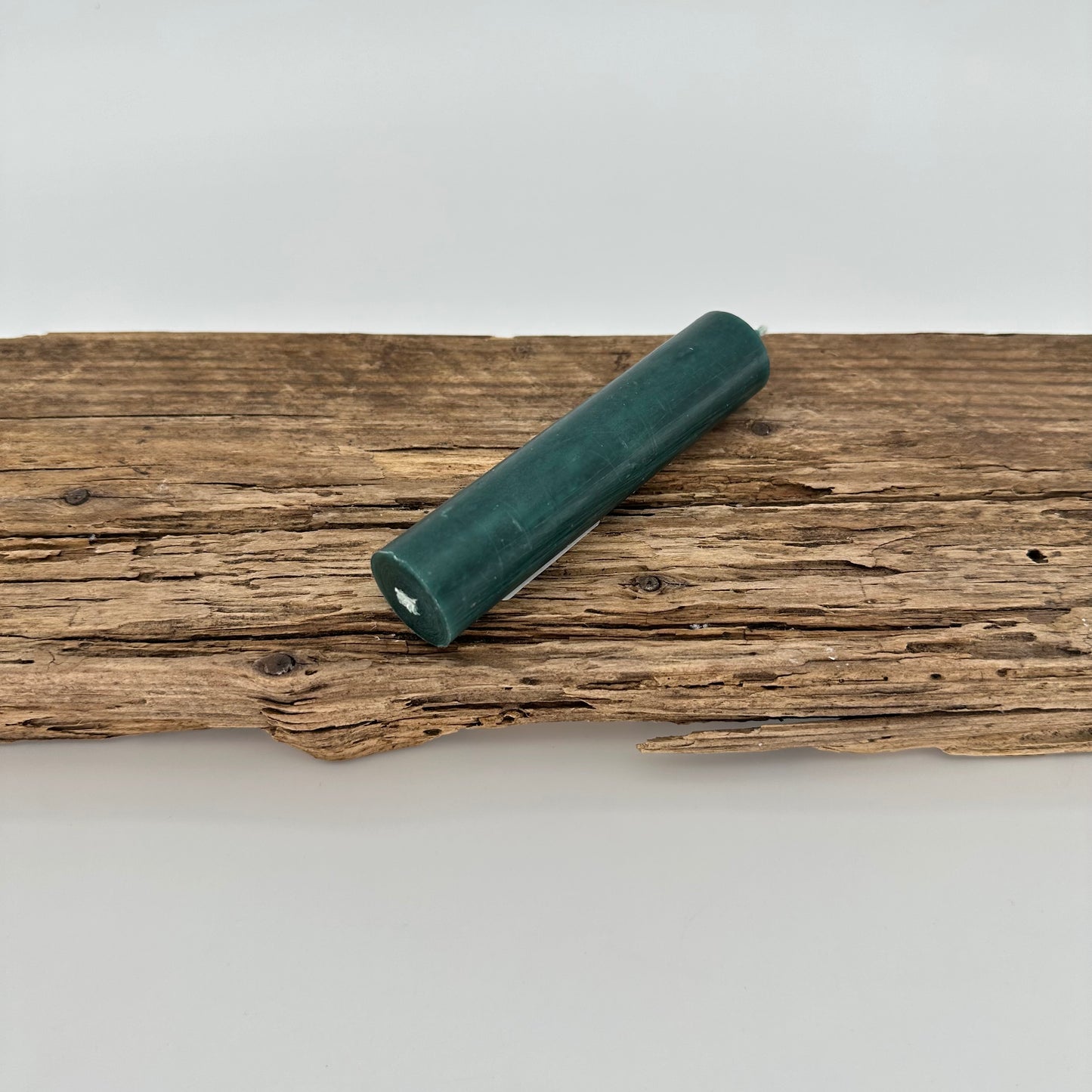 Stabkerze in grünem Petrol