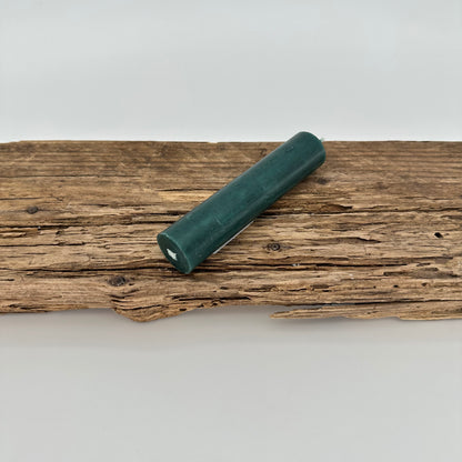 Stabkerze in grünem Petrol