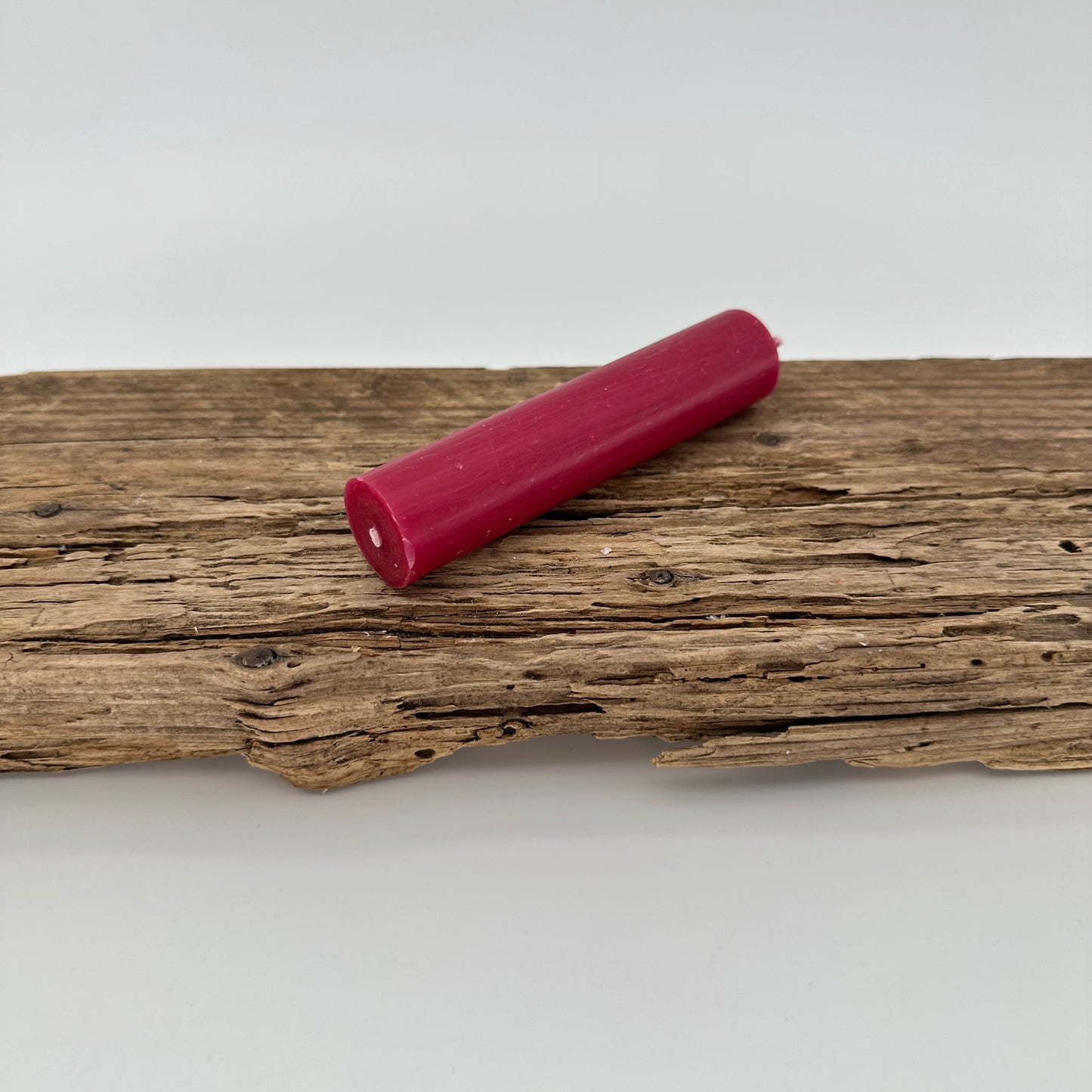 Stabkerze in beeren rot